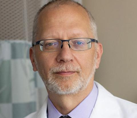 A photo of Henry Kaminski, MD.